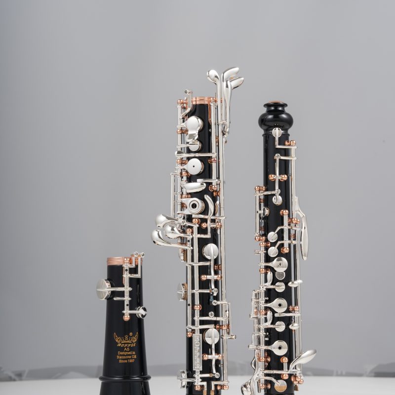 Professional Performance Level Oboe Ebony Body Semi Automatic Rose Gold Posts Silver Plated Keys and a Double-Bell Design