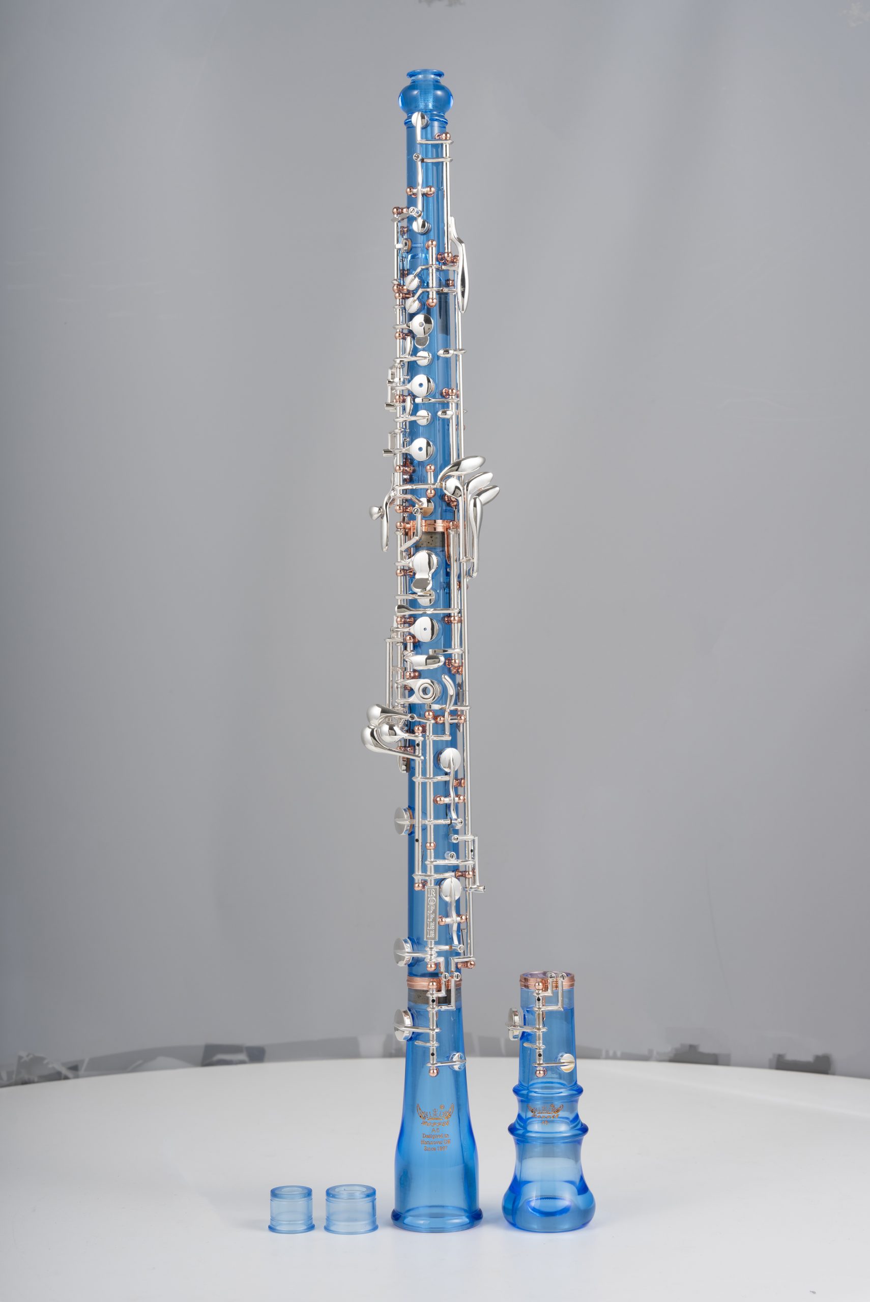 Professional Performance Level Oboe Blue Acrylic Transparent Body Semi Automatic Rose Gold Posts Silver Plated Keys and a Double-Bell Design